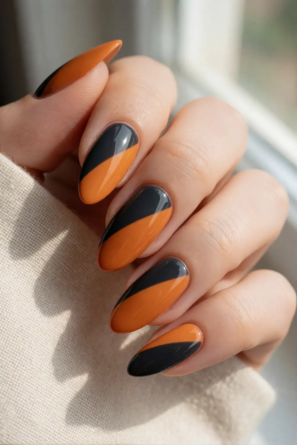 Black and Orange Color-Block Nails