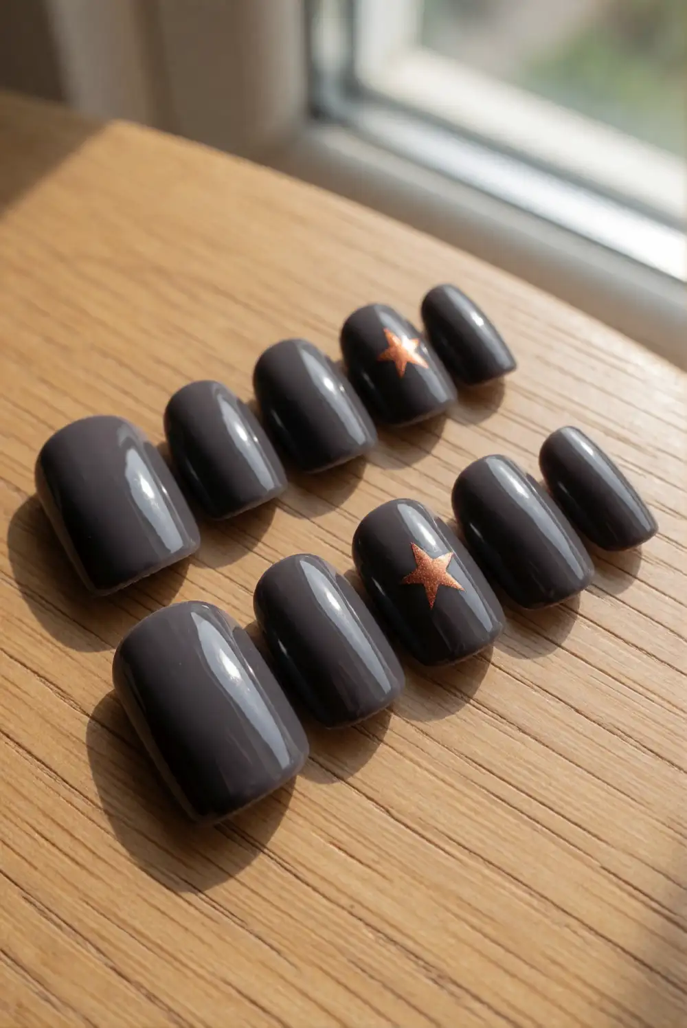 Charcoal and Copper Star Nails