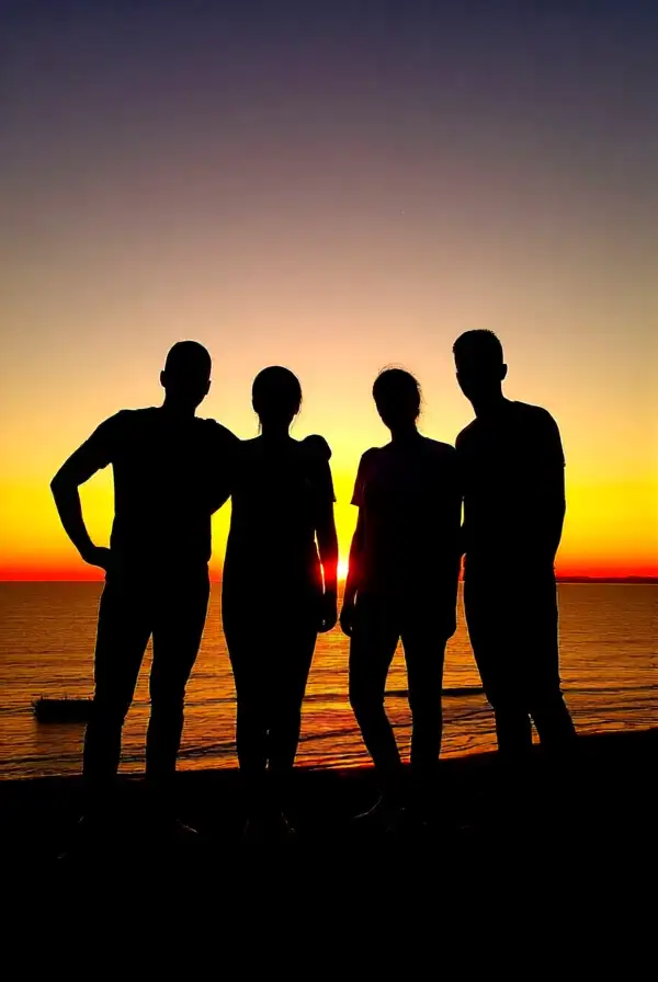 Group Silhouettes at Sunset