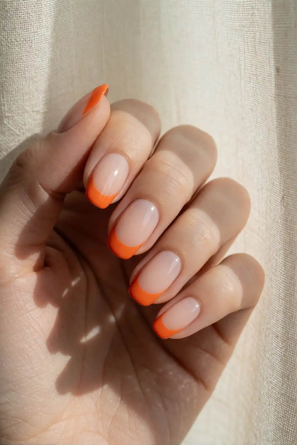 Orange French Tips on Nude Nails