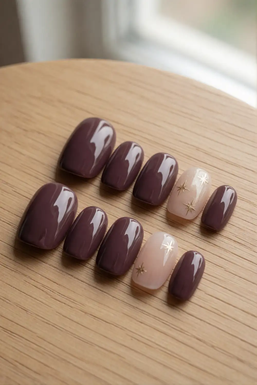 Plum Nails With Tiny Gold Star Details