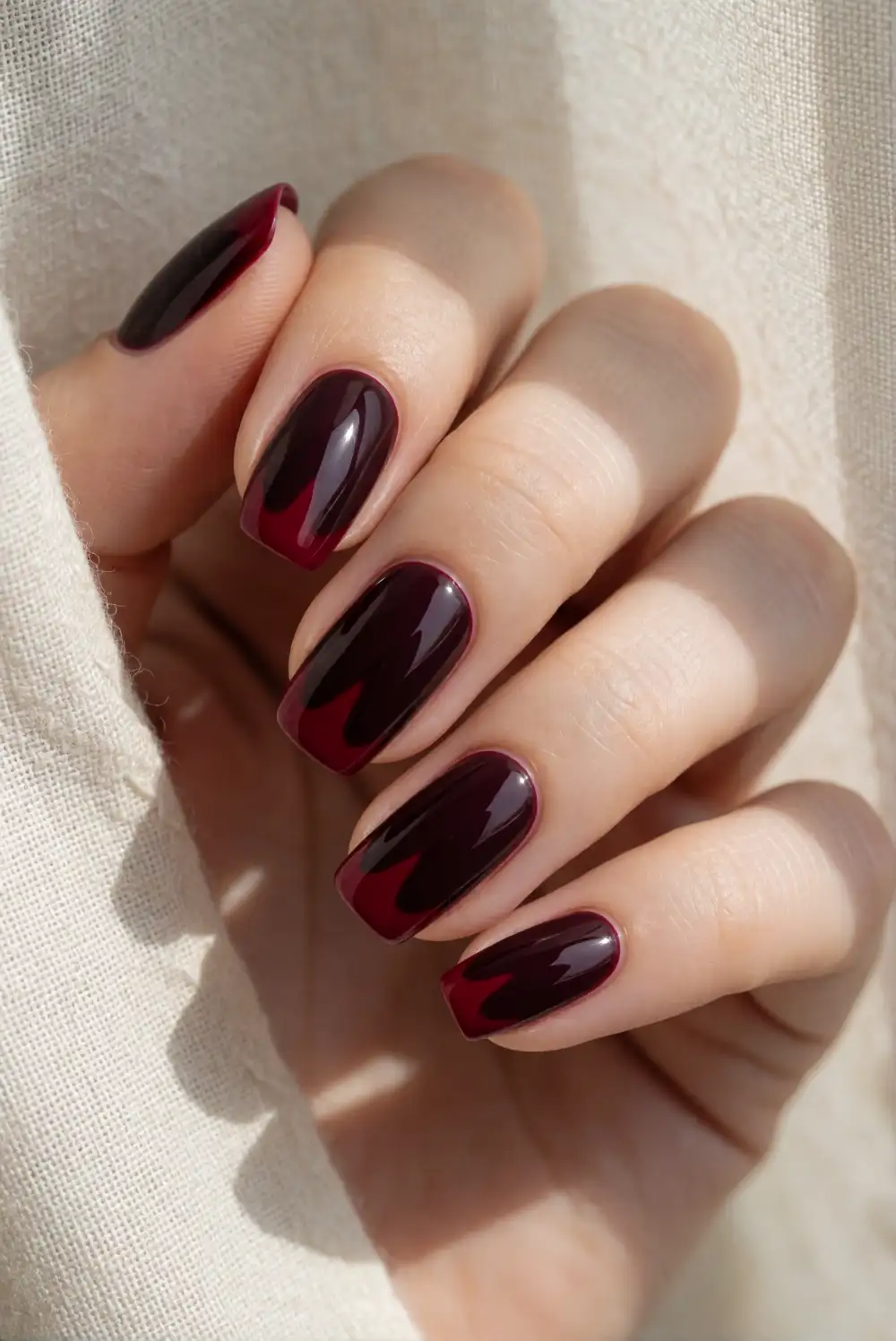 Red Drip Nail Art on Burgundy