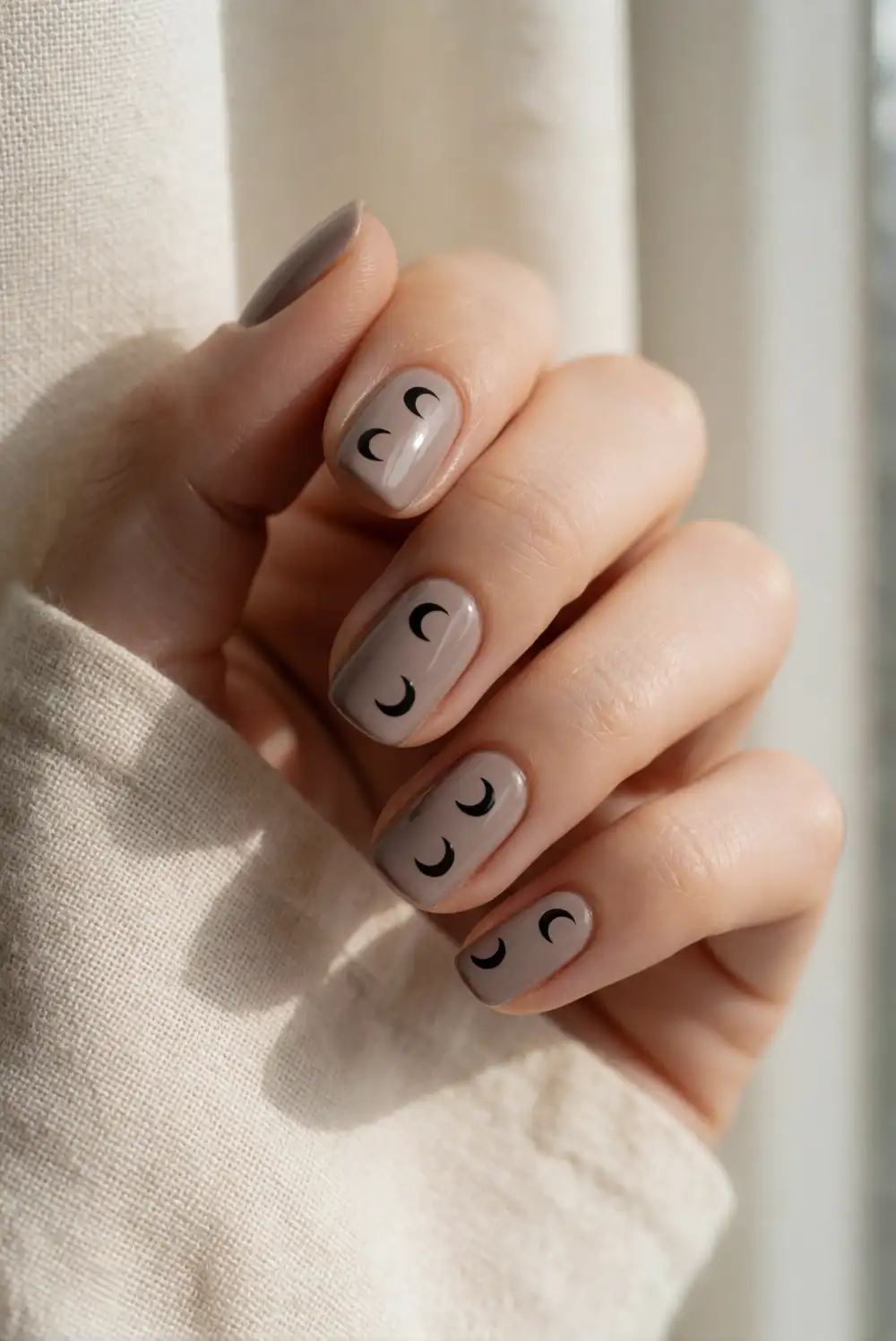 Taupe Nails With Tiny Black Crescent Moons