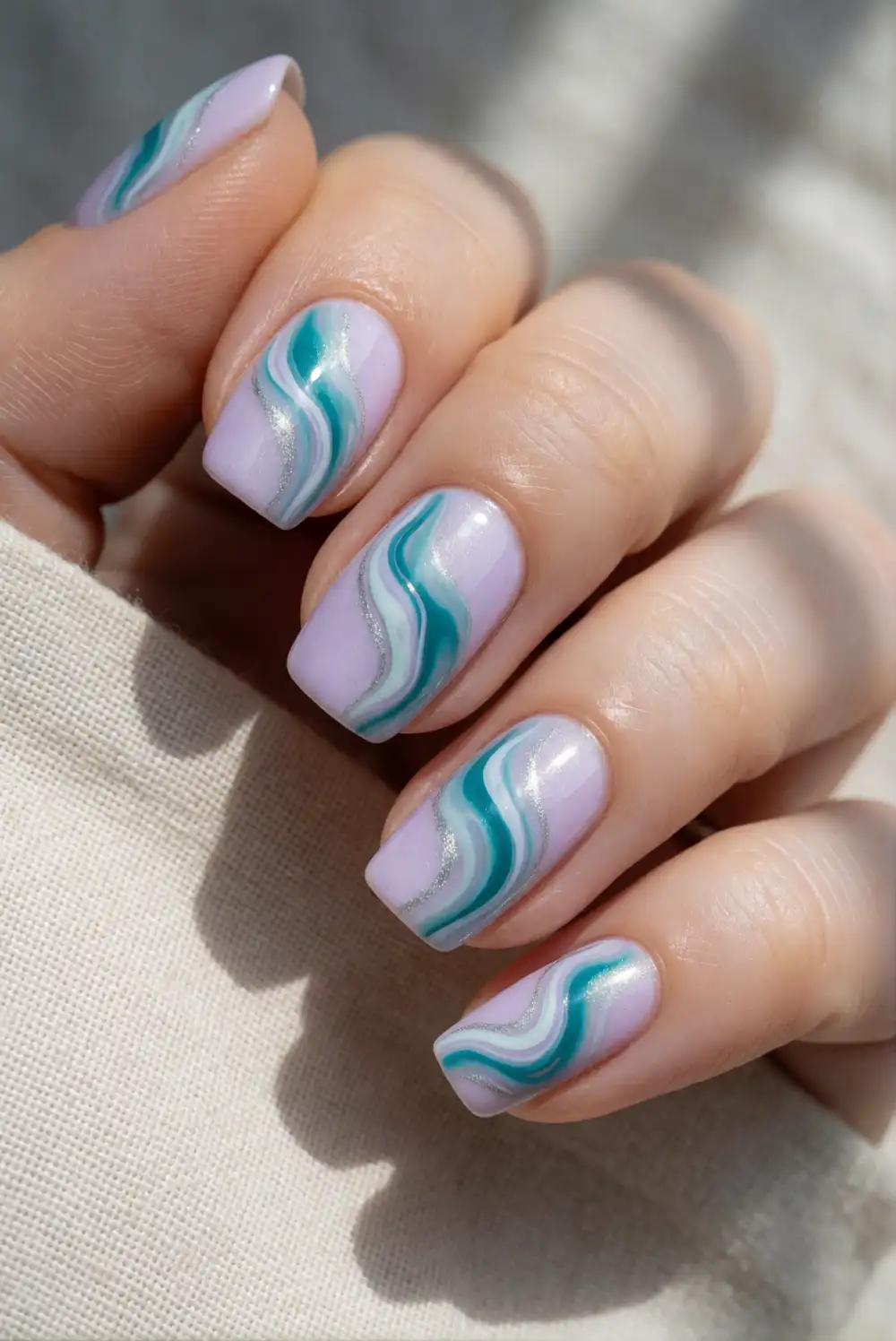 Teal and Lilac Marble Swirl Nails