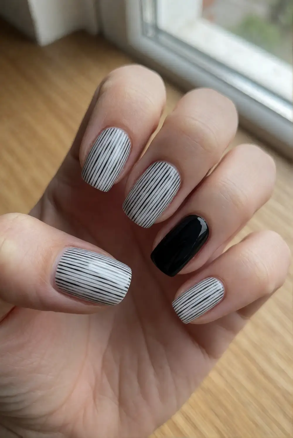Thin Black Stripes on White Nails